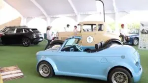 Expo Auto Morelos con exhibición de autos eléctricos y familias recorriendo el evento en Cuernavaca