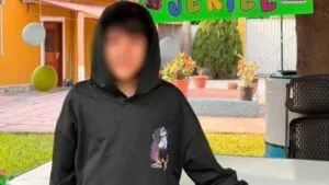 repatriación de menor en Morelos con familia recibiendo a niño tras regresar desde Estados Unidos en Axochiapan